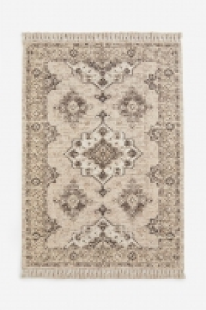 Gemusterter Teppich mit Fransen 84.99 €