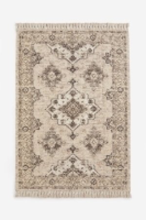 Gemusterter Teppich mit Fransen 54.99 €