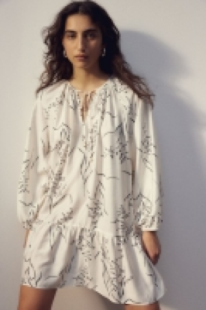 Kleid mit Bindedetail 19.99 €