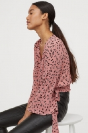  Gemusterte Wickelbluse 9.99 €