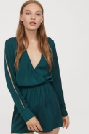  Playsuit mit V-Ausschnitt 12.99 €